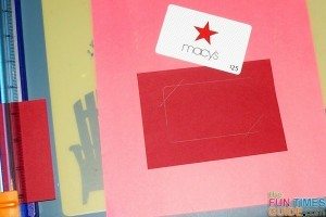 You can turn a regular handmade graduation card into a graduation gift card with a few simple cuts! photo by Suzie at TheFunTimesGuide.com handmade-gift-card