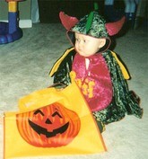 Baby wearing Halloween costume.
