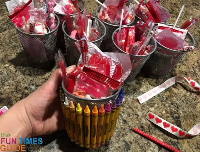 Then I put the Valentines candy into the finished crayon-covered pencil holder basket.
