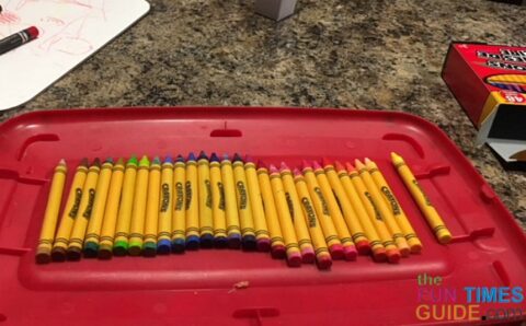 Crayons organized by hue for this DIY teacher gift basket.